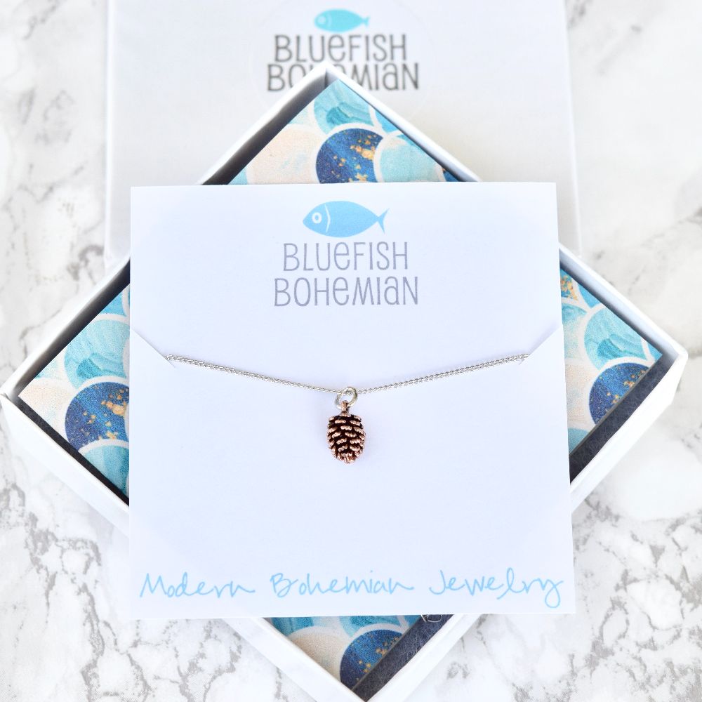 silver rose G pinecone neck