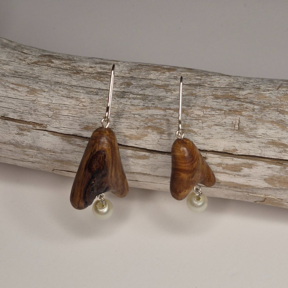 DW and pearl earrings